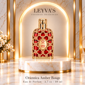 Orientica Amber Rouge - Eau de Parfum - 2.7 oz / 80 ml — producto y pedestal
